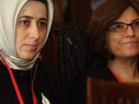 Ms Özlem Zengin and Ms Sevtap Yokuş watch the Easter Rising Commemoration at the Stormont House.