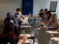 Participants meet with DPI Programmes Director Eleanor Johnson at the Gibson Hotel in Dublin.