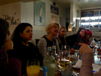 Ms Susan McEwan, Head of Programmes at Corrymeela, discusses reintegration of women with participants over dinner at Deanes Love Fish in Belfast.