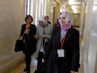Ms Ayşe Koytak, Ms Sevtap Yokuş and Ms Zehra Taşkesenlioğlu walk to a meeting with Sinn Fein MLAs at Stormont House.