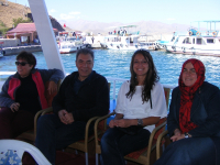 DPI Director Kerim Yildiz, Asli Tunç, Nazvan Mizrak and Fatma Bostan Ünsal on a boat to Akdamar Island